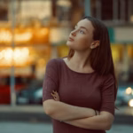 Beautiful lonely girl dreaming thinking