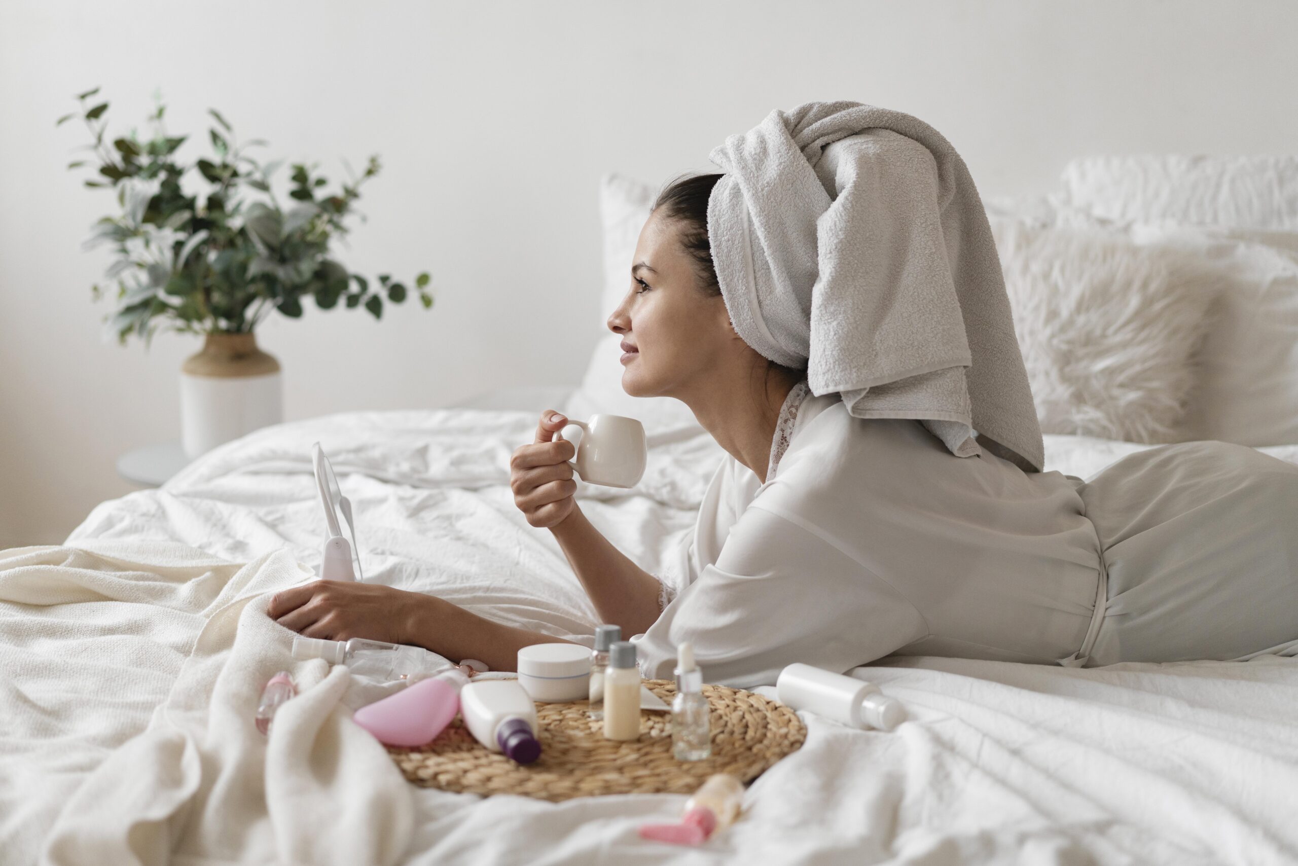 Beautiful woman doing self care treatment indoors